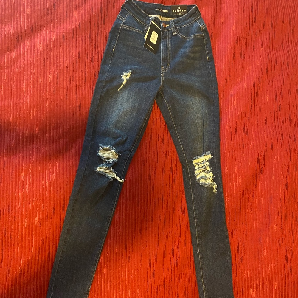 Fashion Nova - Delirious Distressed Skinny Jeans.